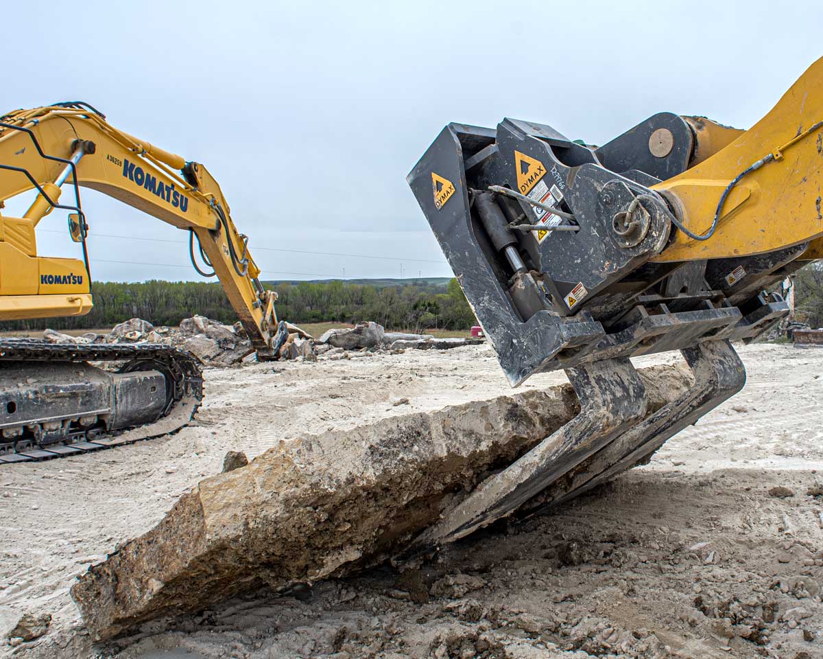 Wheel loader block handling coupler lifting quarry slab