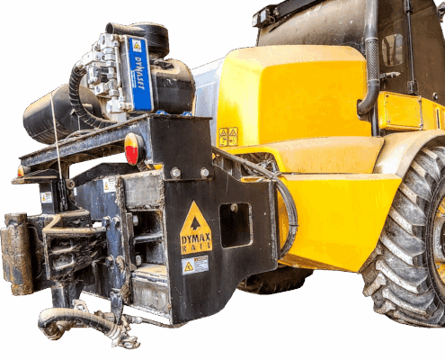 Cat 315 Excavator lifting a large branch after cutting it with a tree shear.