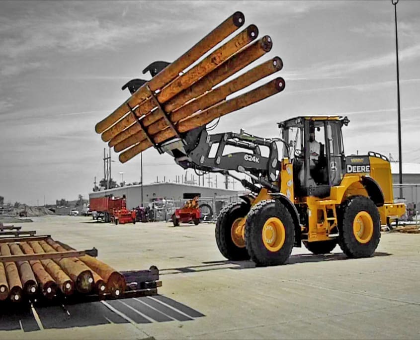 Dymax grapple fork replaces Petibone Cary Lift for moving large utility poles