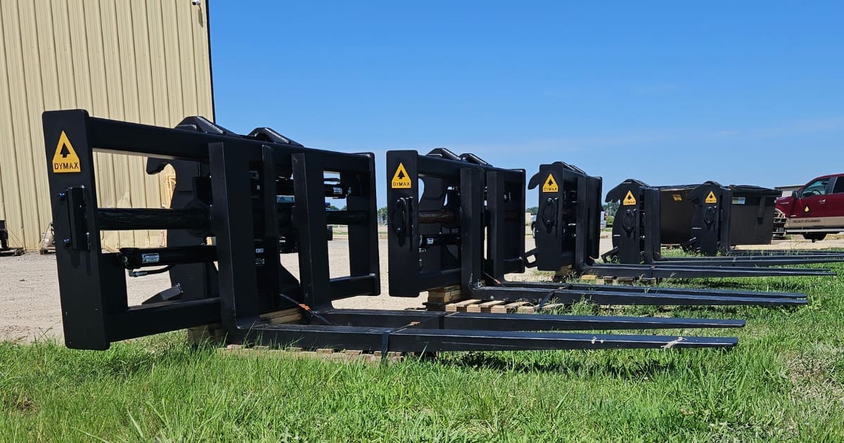 Hydraulic adjustable tine pallet forks for wheel loaders and telehandlers, showing the fork carriage and adjustable tines.