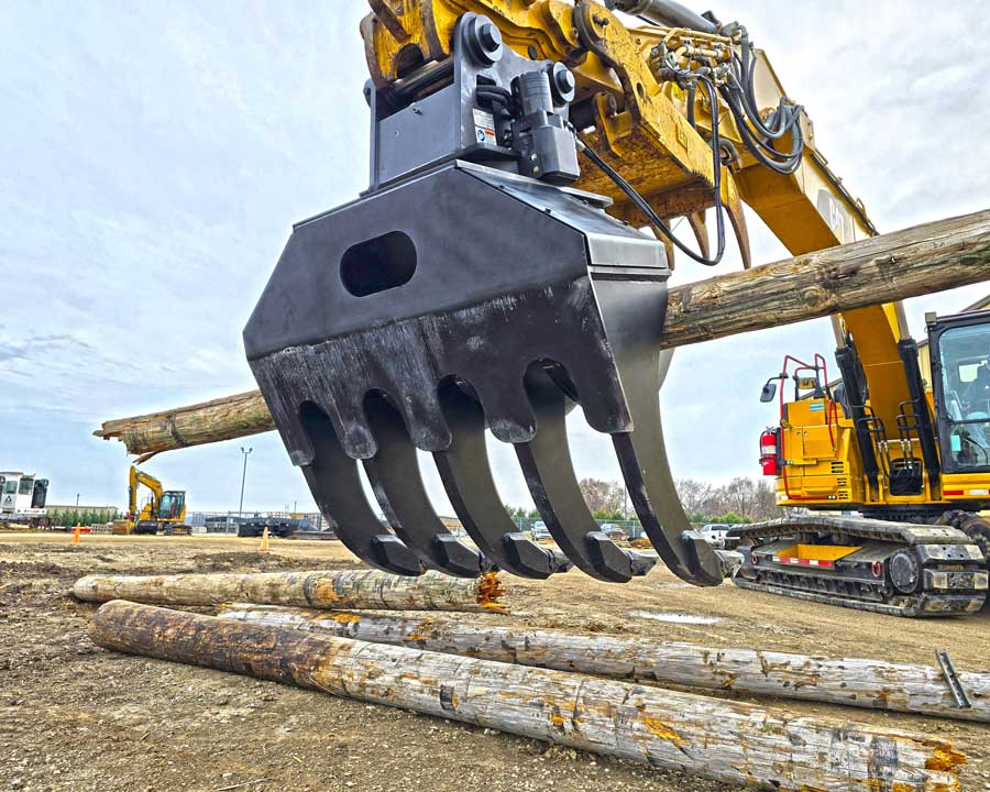 Close-up of Dymax IronClaw excavator claw with heavy-duty T1 steel tines